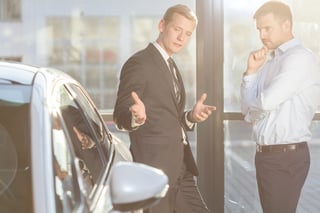 Image of car dealer offering expensive vehicle.jpeg